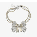 18K  Chanel 25K Bow Tie Choker Necklace