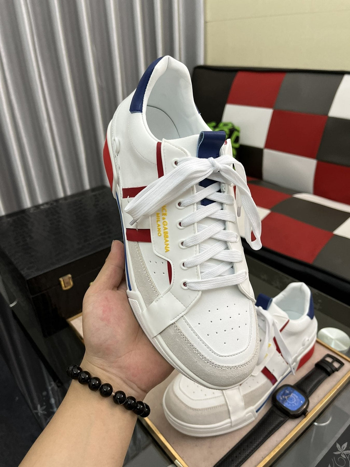 Men's White Low-Top Sneakers with Red and Navy Accents — model