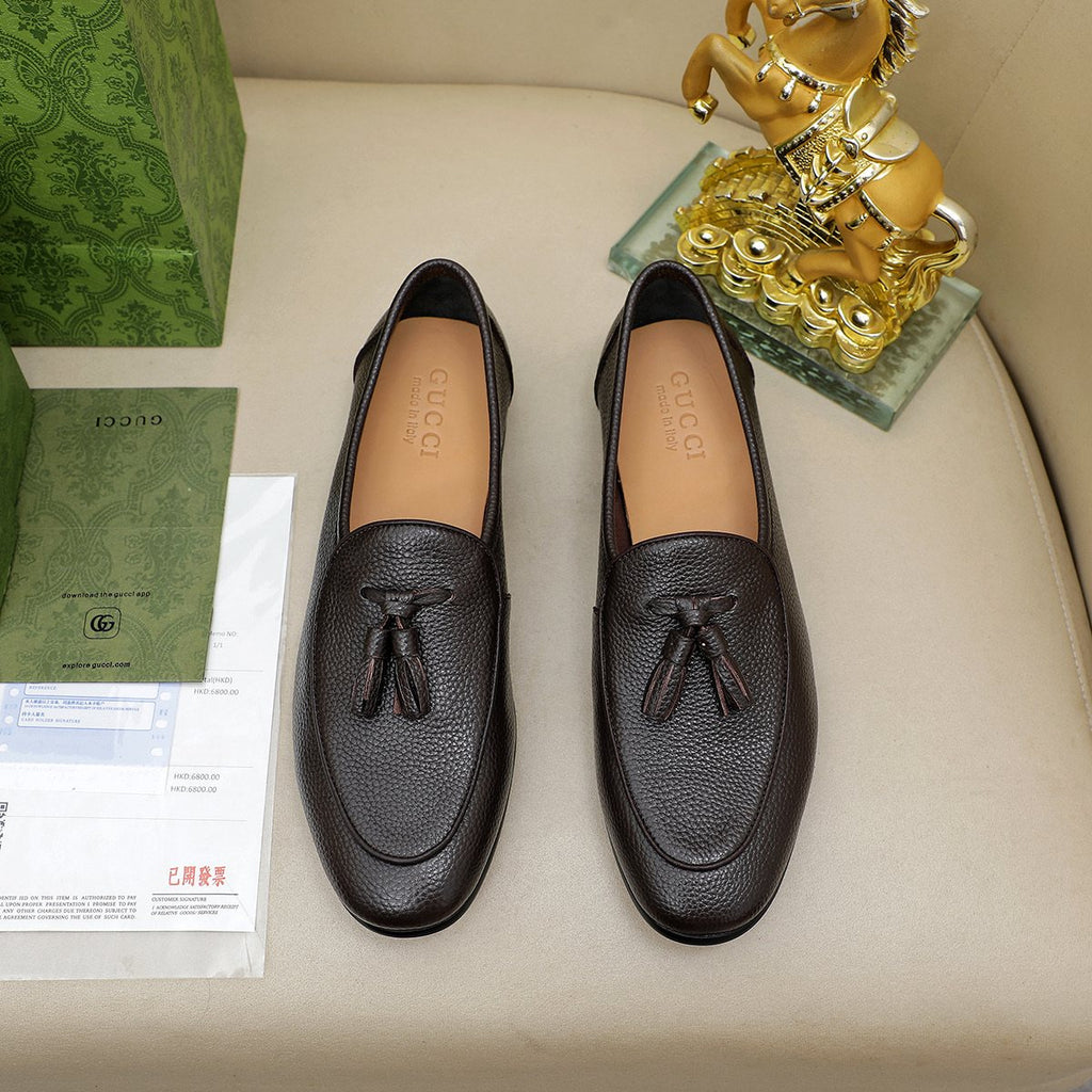 Gucci Textured Tassel Loafers — side